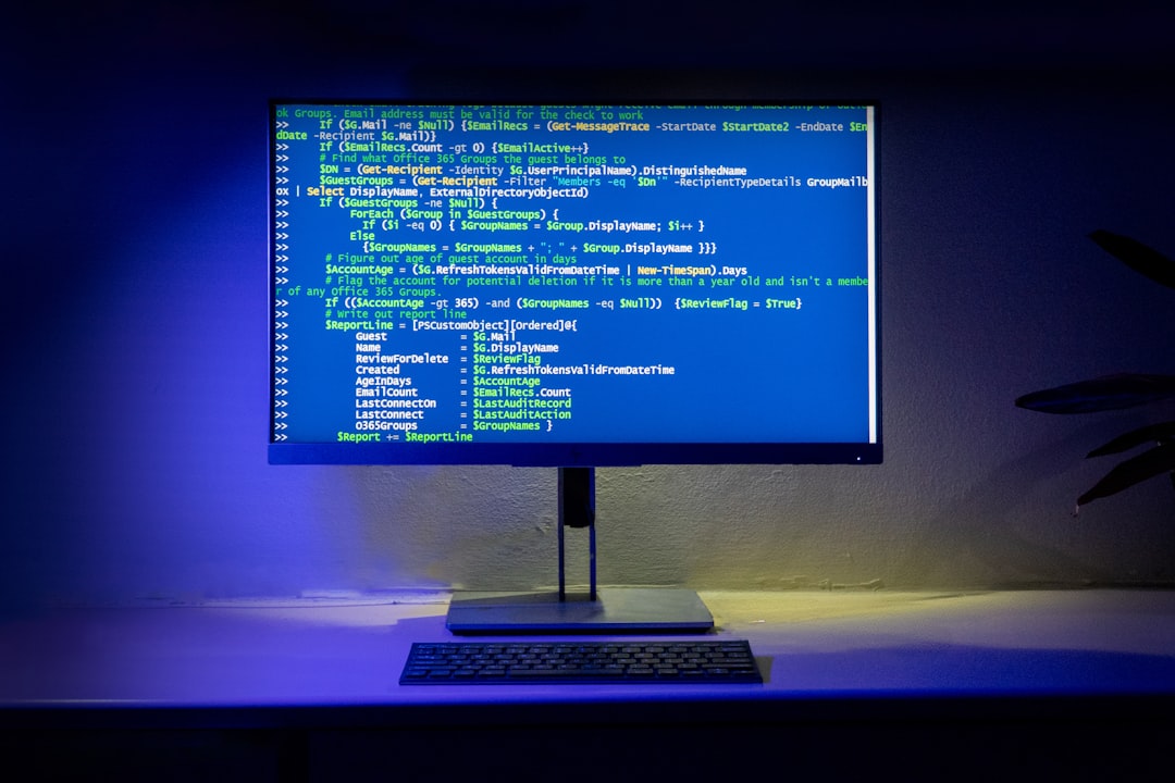 CSS code on computer screen - A computer screen displays code on a desktop.